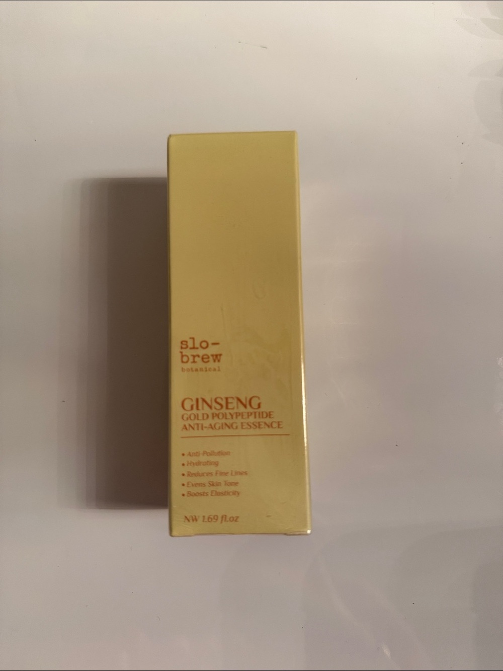 Slowbrew Ginseng Gold Polypeptide Anti-Aging Essence - Yellow